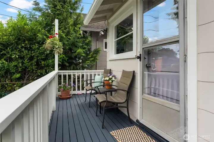 The back deck leading out to the back yard.