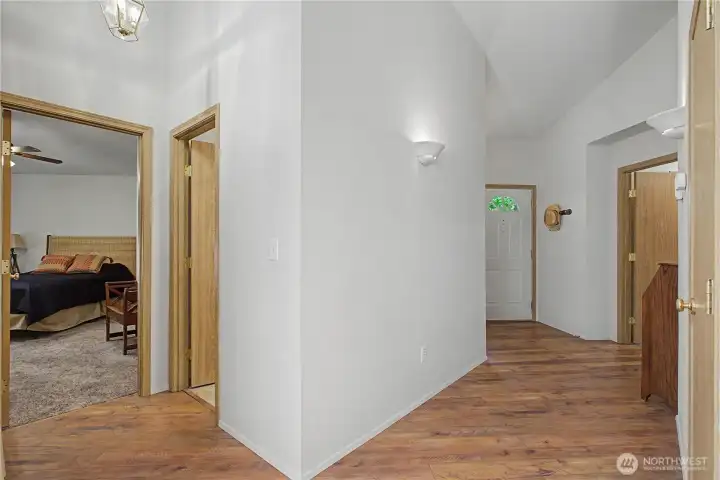 Laminate flooring in the hallway and living room. Laminate flooring in the hallway and living room.