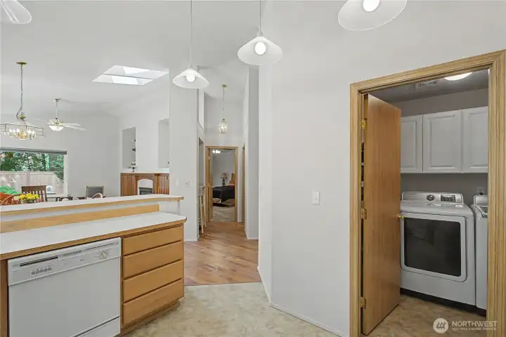 Kitchen with laundry room with storage. Kitchen with laundry room with storage.