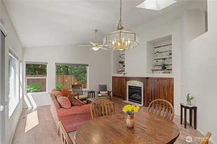 Living room offers gas fireplace with covered cabinets on each side. Living room offers gas fireplace with covered cabinets on each side.