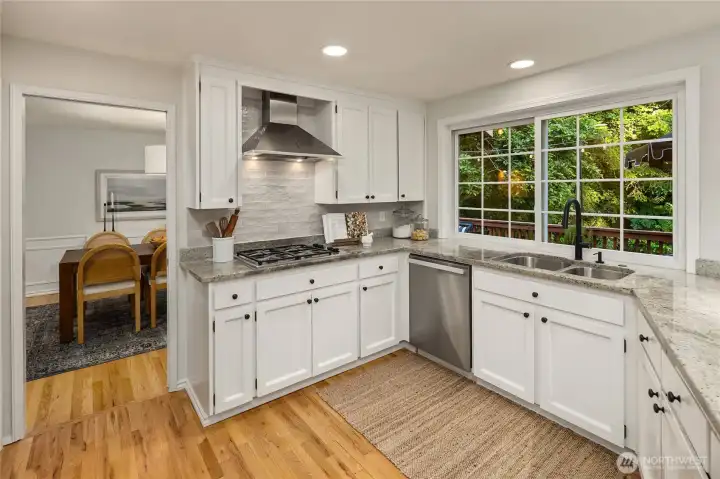 This thoughtful kitchen with its practical work triangle offers both exceptional functionality and a welcoming space for casual dining.