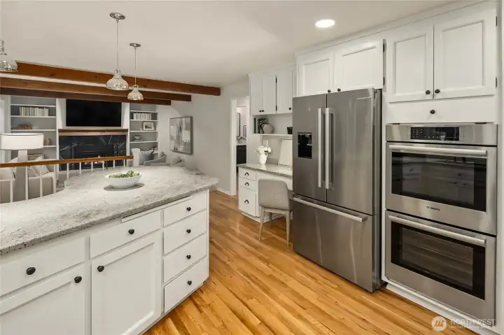 Kitchen in the heart of it all- connected to the bonus room, dining room and outdoor living space. Steps from the luxurious and impeccably maintained spa/hot tub and cold plunge outside below.