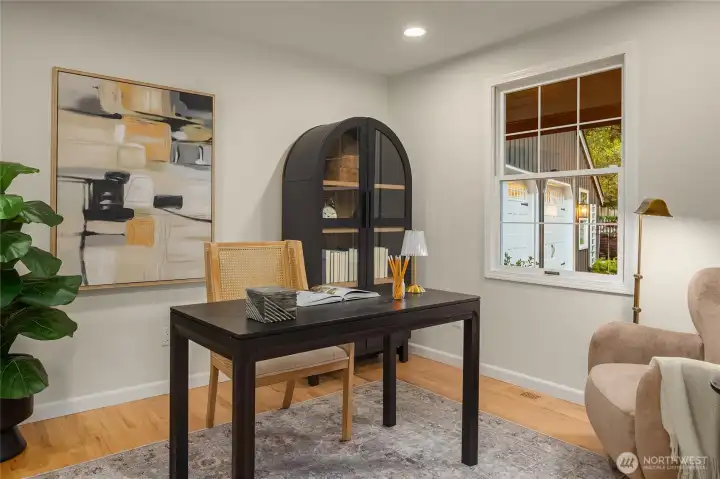 Flexible main floor office or bedroom - near the entry of the home and perfect for guests or working from home. Beautiful views of the front landscaping and full of natural light.