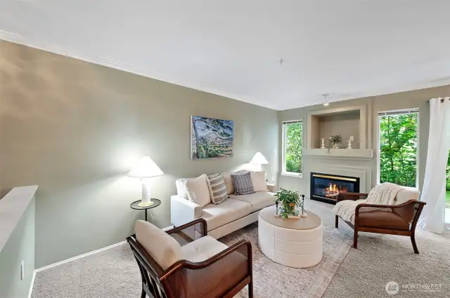 The open layout flows effortlessly into the dining and living areas, creating a warm and inviting space ideal for relaxing or gathering with friends