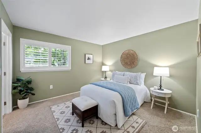 with natural light filters in through the windows, creating a cozy and restful ambiance