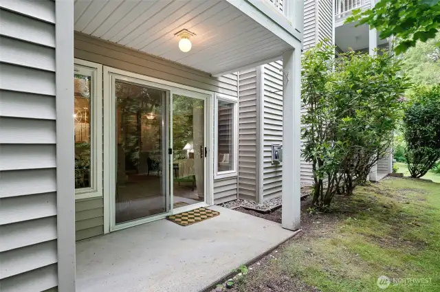 private patio facing a lush green belt corner unit!