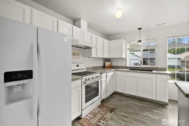 Engineered Laminate Flooring and Nice Kitchen Aid Stove