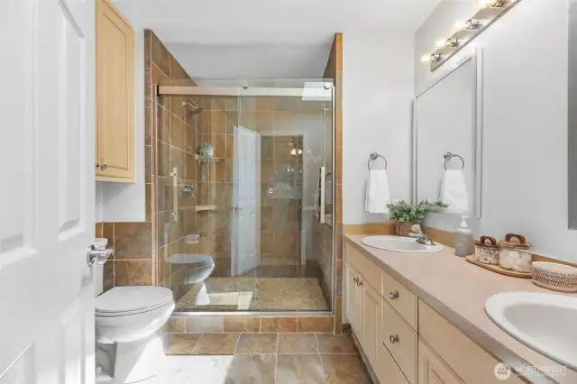 Primary Bath with custom step in shower