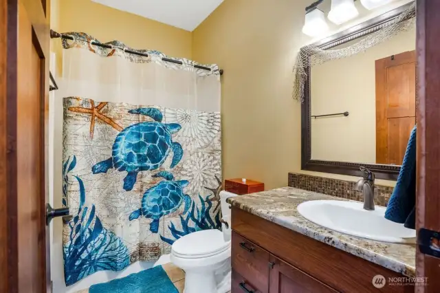 Guest bath just off dinning room and kitchen