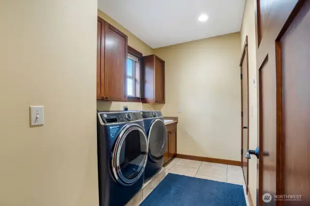 Laundry room that leads out to the garage