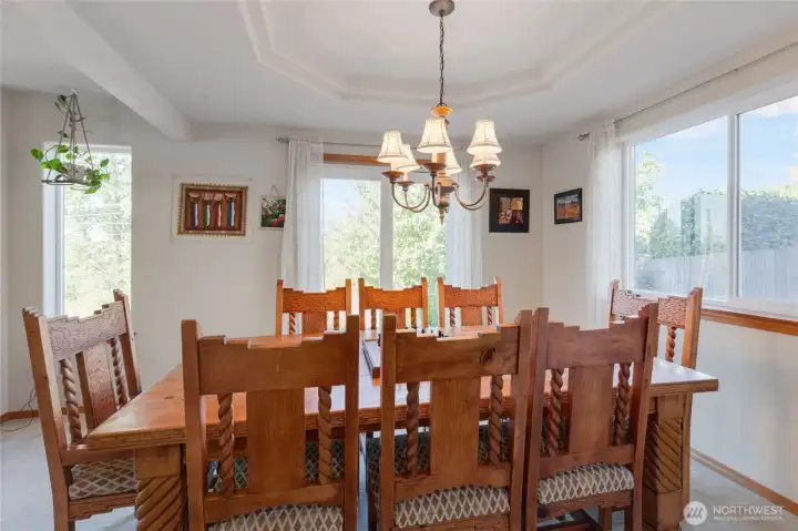 One of the best features of this home is how little impact you feel from neighbors.  The formal dining room is a great example of this; just natures beauty and natural light, this type of setting is so hard to find in newer communities today!