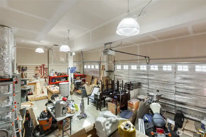 The 3-car garage is a HUGE bonus, plenty of room for parking and storage. So many homes at this price point have only a 2-car garage.  The tall ceilings also make overhead storage an option for the new owner.  Enjoy a gas forced-air furnace and on demand hot water (both just serviced).