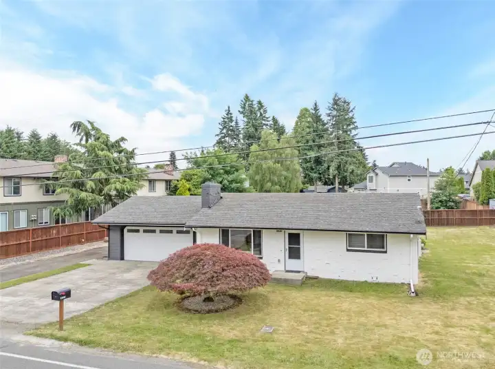 Beautifully updated property features  mature landscaping.