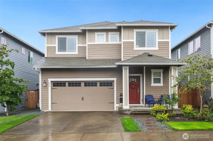 Spacious and smart house design in Woodbury Crossing--a tree-lined neighborhood on a quiet interior street in West Olympia!  Note the custom stones leading to the covered porch--a recent addition!