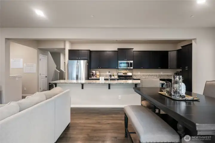 View of this wonderful kitchen/bar island from slider, looking toward the front of the house.