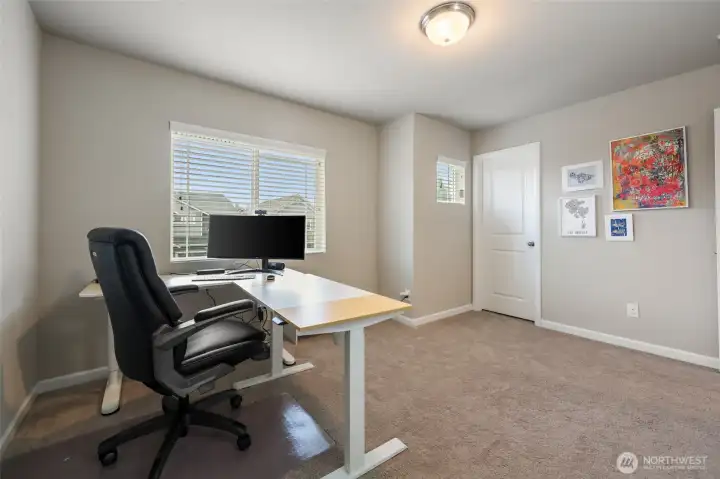 Two front windows and walk-in-closet make this flex room very versatile!