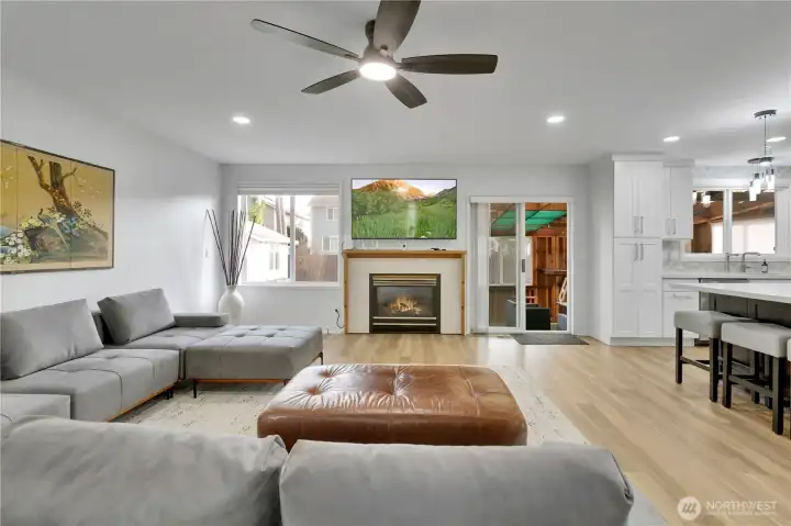 Living Room features gas fireplace and new flooring