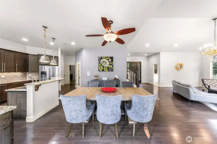 Large dining area open to kitchen and living spaces