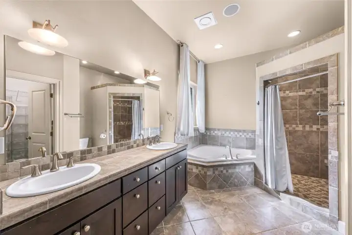 Primary bathroom with dual vanity and large walk-in shower