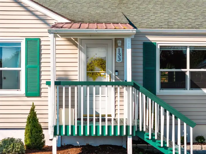 Enjoy small town charm from the quaint front porch of this home.