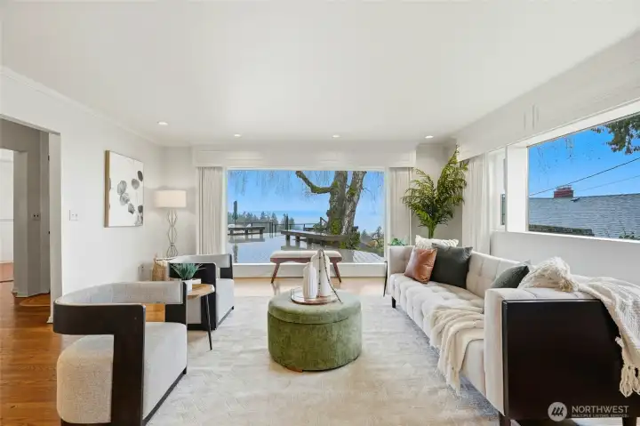 Cozy living room with fireplace and view.