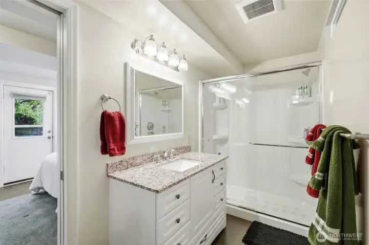 Bathroom with direct access to 3rd bedroom.