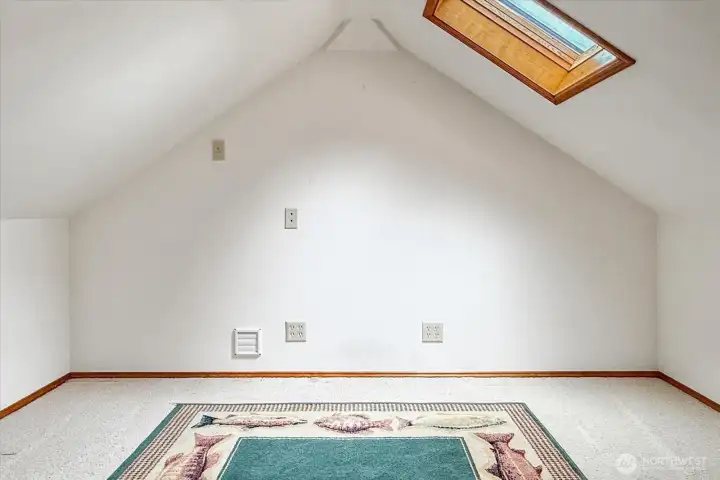 Extra finished room above the garage accessed from the bonus room