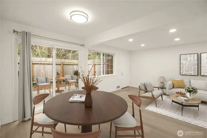 Living area and dining space (virtually staged)