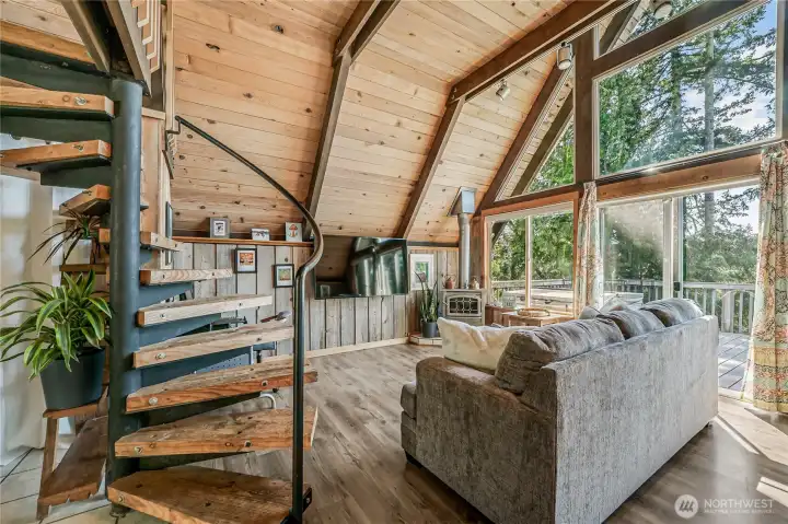 Gorgeous designer stairs lead up to the Primary Loft bedroom.