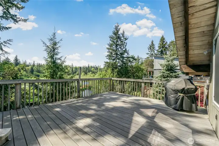 Spacious deck overlooking the Lake is perfect for entertaining!