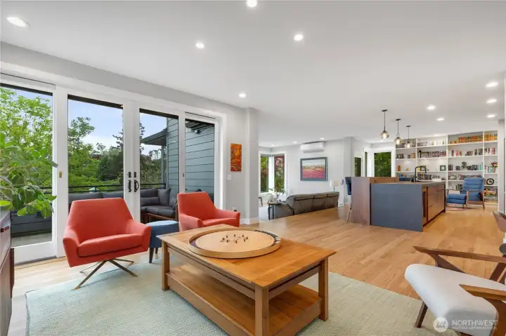 The reverse floor plan places the primary living level on the top floor where you can enjoy views of Rainier, the Cascades, and the city.