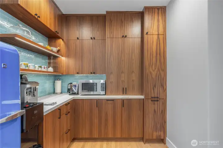 The butler's pantry makes a perfect coffee bar, and the floor to ceiling storage has room for all your kitchen needs.