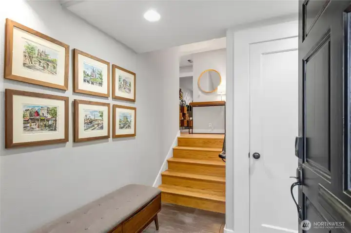 Entering fron the front door you have a spacious foyer with a closet, up the stairs is a second centy loset as well as a large open closet space with hooks for jackets - it easy to crate landing zones here for ease with coming and going.