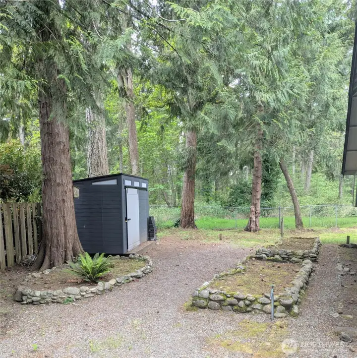 Storage shed included