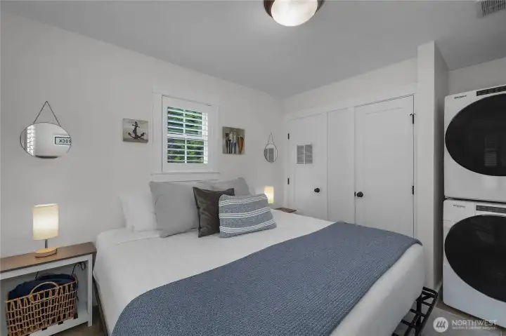 Bedroom currently furnished with a king-sized bed, great place to rest after a day at the beach