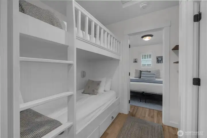 Built in bunk beds with storage drawers below