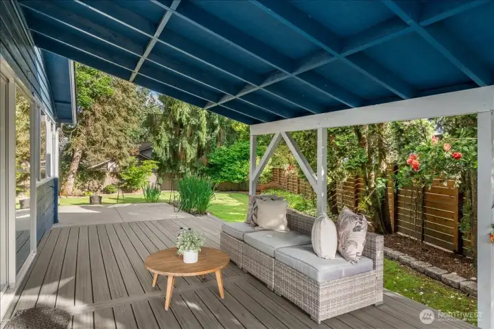Covered Deck – Covered outdoor deck with space for seating and relaxation. Overlooks the landscaped backyard and provides a comfortable setting for outdoor enjoyment.