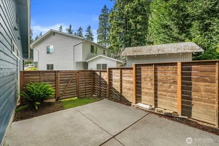 Patio Area – Private patio space with fencing and room for outdoor seating or container gardening. Conveniently located adjacent to the home and yard.