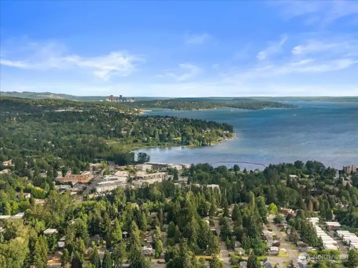 Regional Aerial View – Sweeping aerial view of the surrounding area featuring nearby waterfront, natural scenery, peekaboo view of the lake, and established residential neighborhoods.