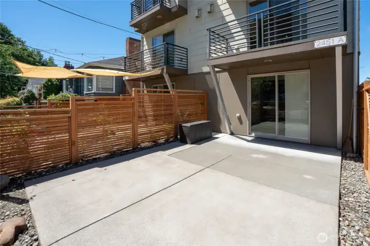 Lounging / entertaining patio has entry from third bedroom/office and a wooden gate to walkway by main door. Lounging / entertaining patio has entry from third bedroom/office and a wooden gate to walkway by main door.