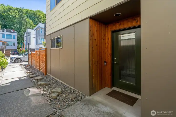 Convenient gate to patio off walkway to main door. Convenient gate to patio off walkway to main door.
