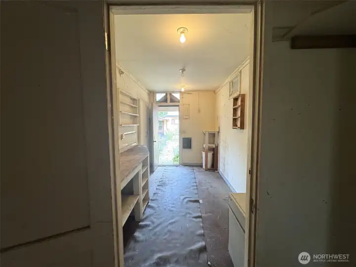 From garage to side door that goes out to the back yard.