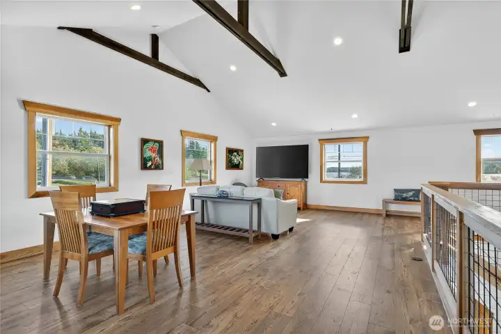 Anchored by timeless charm, the generous loft provides an elevated living space filled with warmth and character.