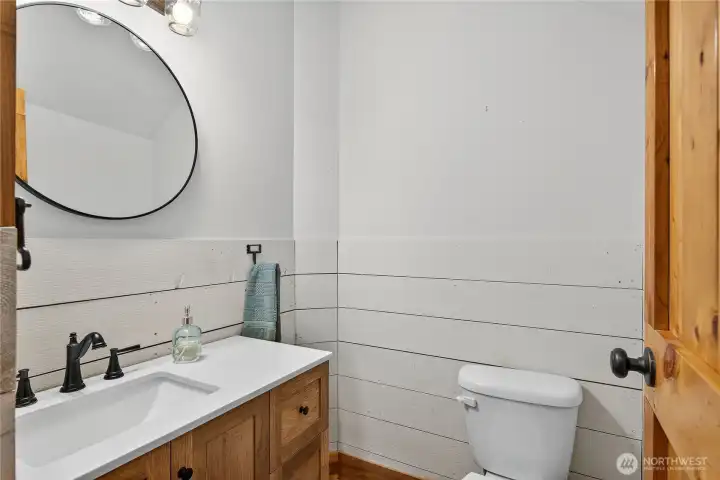 Main Floor half bath just off the laundry room breezeway.