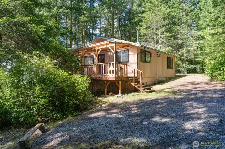 Sweet little cabin with new covered wrap around deck. Sweet little cabin with new covered wrap around deck.