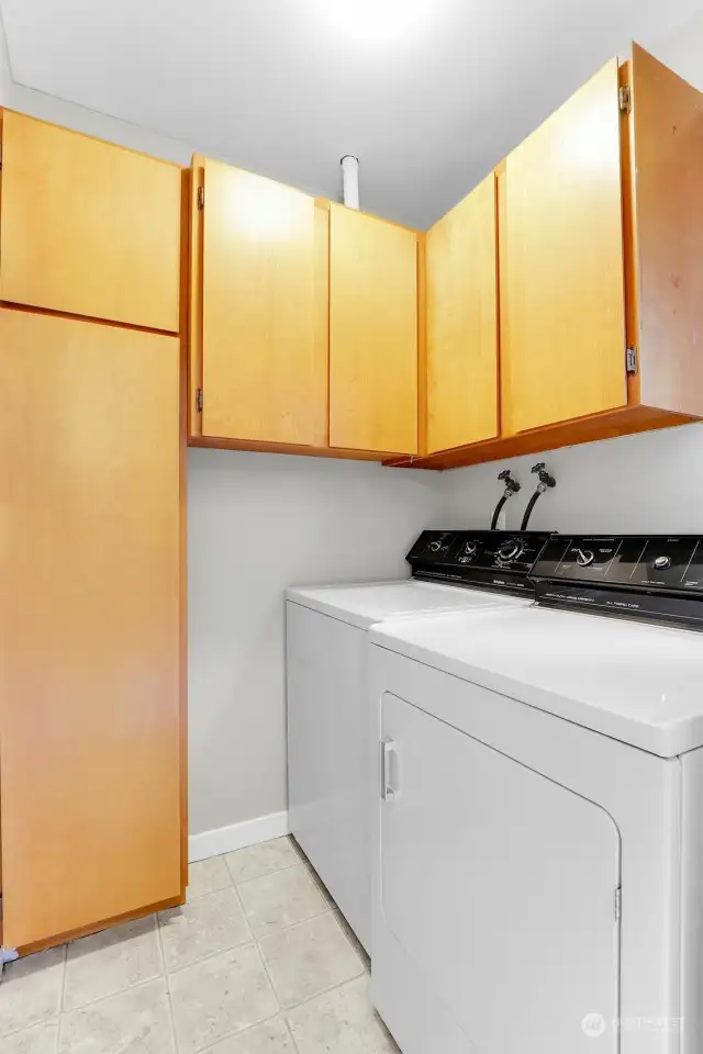 Utility Room with storage and electric W/D