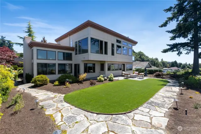 Back view of home and landscaping.