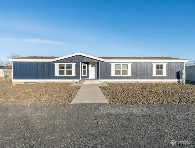 Front view of home with brand new. exterior paint.