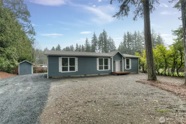 Oversized lot with plenty of parking & a few trees for privacy.