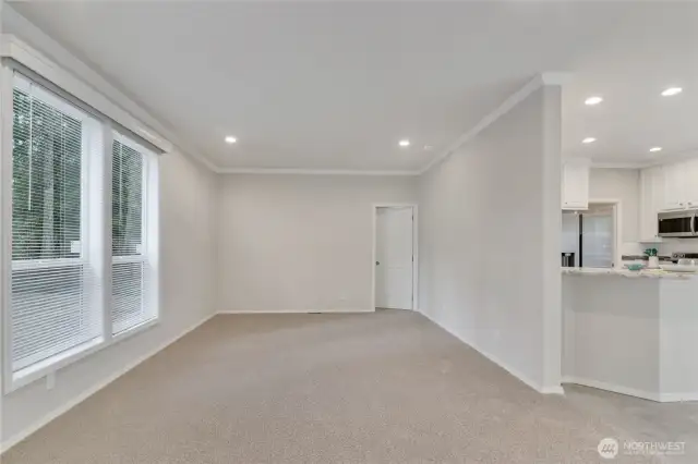 Oversized windows & 9' Ceilings make this living room feel even bigger!